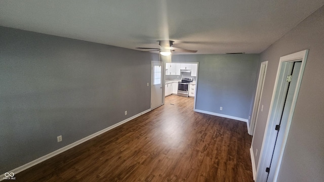 4614 Runyon Lake Dr W, Greenwood, IN 46143 - spare room featuring ceiling fan and dark wood-style flooring