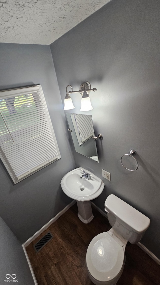 4614 Runyon Lake Dr W, Greenwood, IN 46143 - bathroom featuring wood finished floors and a sink