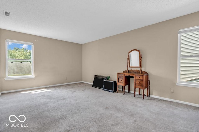 2309 Westmere Dr, Plainfield, IN 46168 - living area featuring plenty of natural light and carpet floors