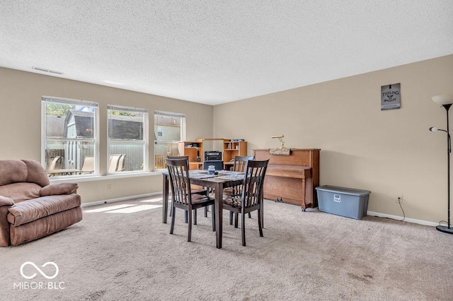 2309 Westmere Dr, Plainfield, IN 46168 - dining room featuring a textured ceiling and carpet floors