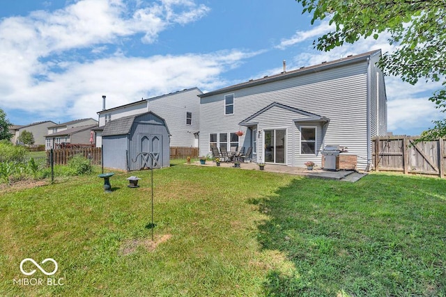 2309 Westmere Dr, Plainfield, IN 46168 - back of property with a shed, a patio area, and a fenced backyard