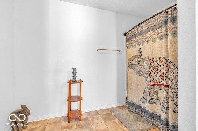 2309 Westmere Dr, Plainfield, IN 46168 - bathroom featuring curtained shower and tile patterned flooring
