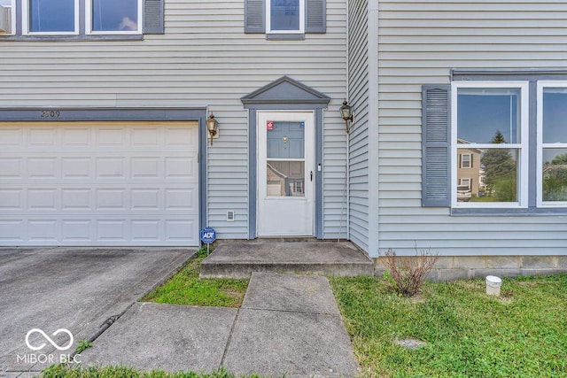 2309 Westmere Dr, Plainfield, IN 46168 - doorway to property featuring a garage and driveway