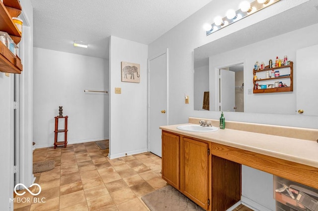 2309 Westmere Dr, Plainfield, IN 46168 - bathroom with vanity and a textured ceiling