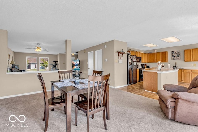2309 Westmere Dr, Plainfield, IN 46168 - dining space with light carpet and ceiling fan