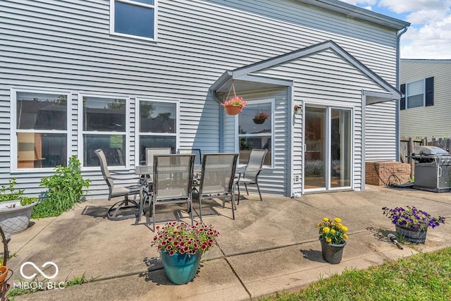2309 Westmere Dr, Plainfield, IN 46168 - view of patio featuring a grill and outdoor dining area