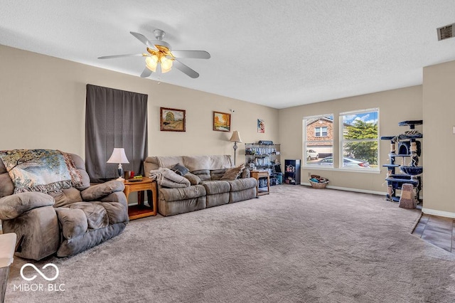2309 Westmere Dr, Plainfield, IN 46168 - living area with a textured ceiling, a ceiling fan, and carpet floors