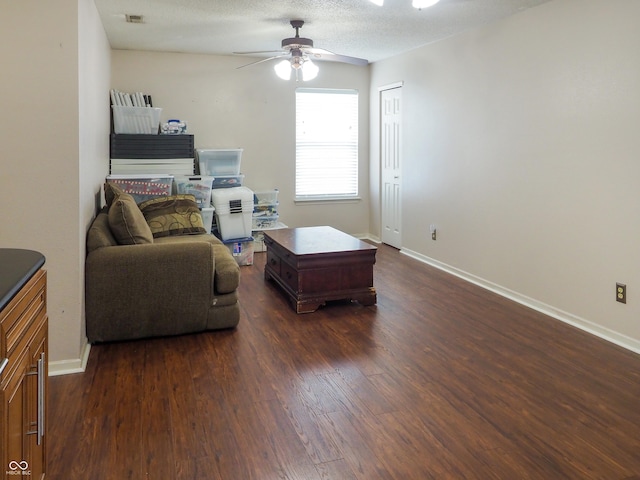 2355 Collins Way, Greenfield, IN 46140 - living room featuring ceiling fan and dark wood finished floors