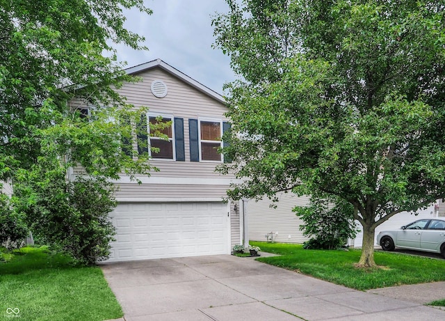 2355 Collins Way, Greenfield, IN 46140 - view of front of house with an attached garage, driveway, and a front yard