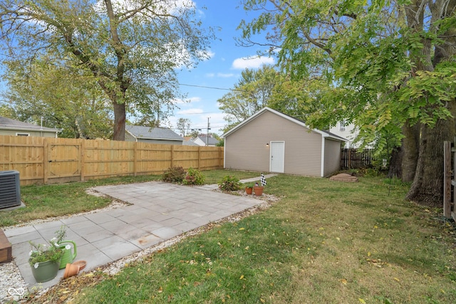2026 E 10th St, Indianapolis, IN 46201 - fenced backyard with a patio area and an outdoor structure