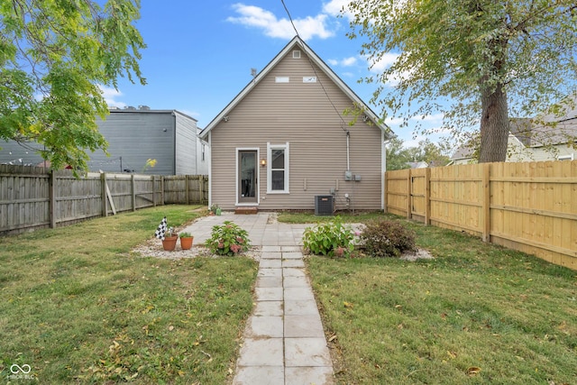 2026 E 10th St, Indianapolis, IN 46201 - back of property featuring a fenced backyard and a patio