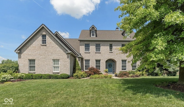 8754 Lily Ct, Zionsville, IN 46077 - view of front of property featuring brick siding and a front yard