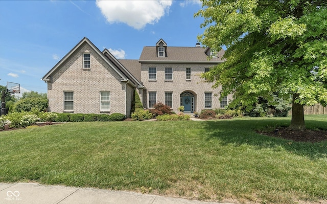 8754 Lily Ct, Zionsville, IN 46077 - colonial inspired home featuring brick siding and a front lawn