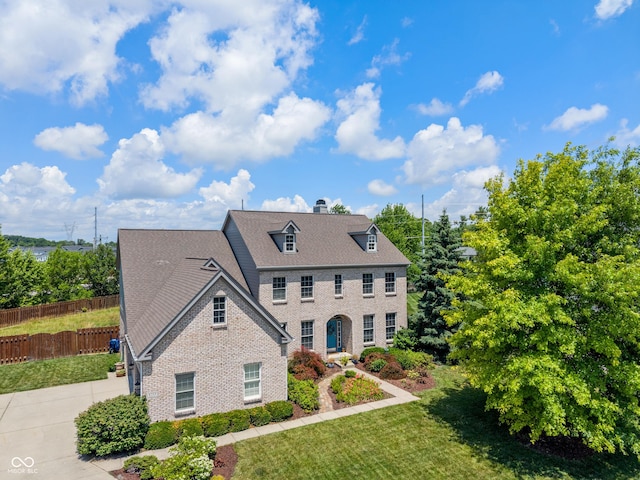 8754 Lily Ct, Zionsville, IN 46077 - view of front of home featuring brick siding and a chimney
