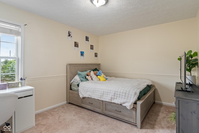 8754 Lily Ct, Zionsville, IN 46077 - bedroom with light colored carpet and a textured ceiling