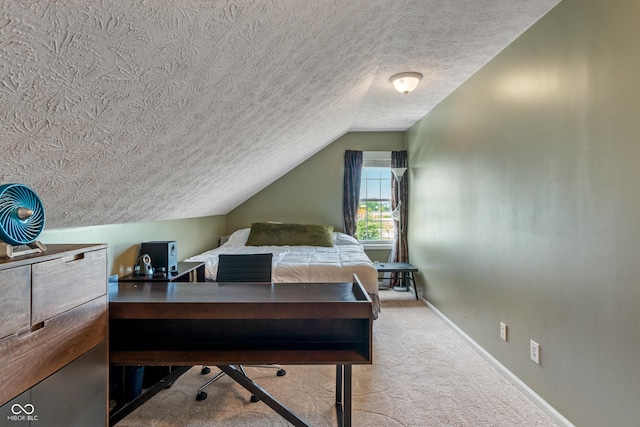 8754 Lily Ct, Zionsville, IN 46077 - carpeted bedroom featuring a textured ceiling, vaulted ceiling, and a desk