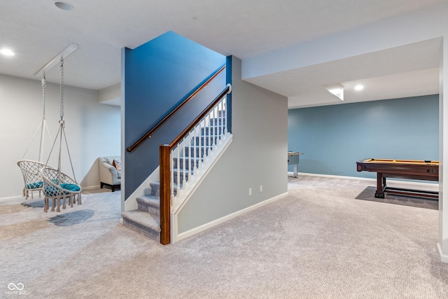 8754 Lily Ct, Zionsville, IN 46077 - staircase featuring carpet flooring, pool table, and recessed lighting