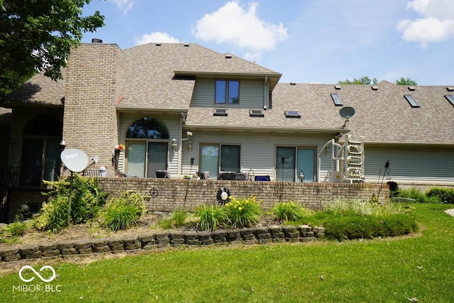 5586 S 200 E, Franklin, IN 46131 - rear view of property with a chimney, a yard, and roof with shingles