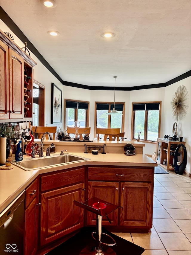 5586 S 200 E, Franklin, IN 46131 - kitchen featuring stainless steel dishwasher, light countertops, light tile patterned floors, crown molding, and recessed lighting