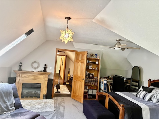 5586 S 200 E, Franklin, IN 46131 - bedroom featuring lofted ceiling, light colored carpet, a glass covered fireplace, and ceiling fan