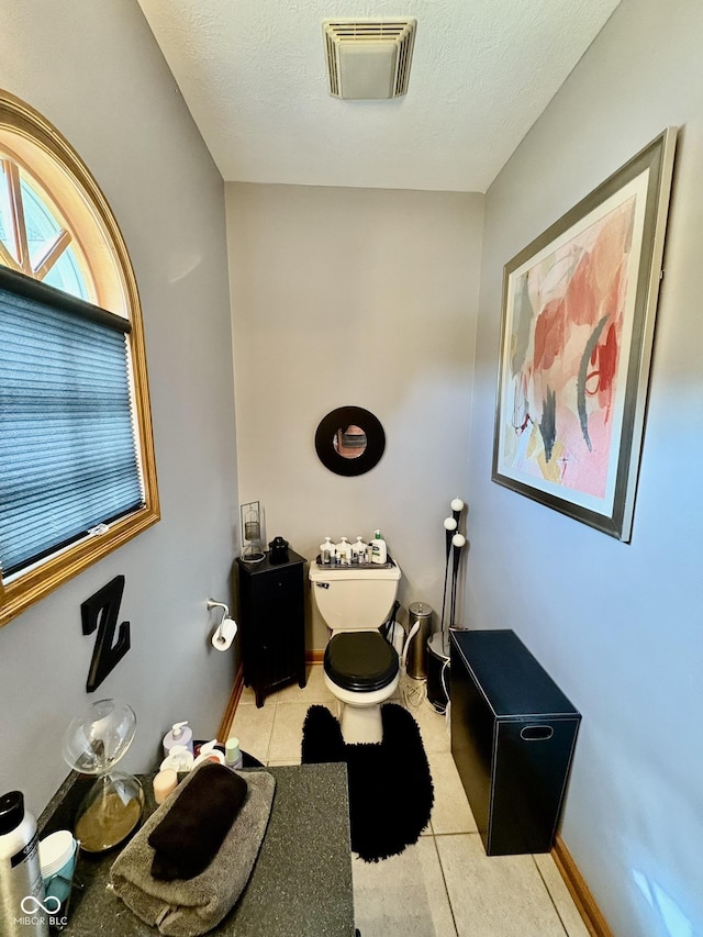 5586 S 200 E, Franklin, IN 46131 - bathroom featuring tile patterned floors and a textured ceiling