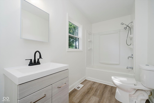3709 Central Ave, Indianapolis, IN 46205 - bathroom with vanity, wood finished floors, and bathing tub / shower combination