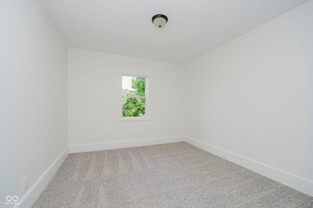 3709 Central Ave, Indianapolis, IN 46205 - empty room with carpet flooring and baseboards