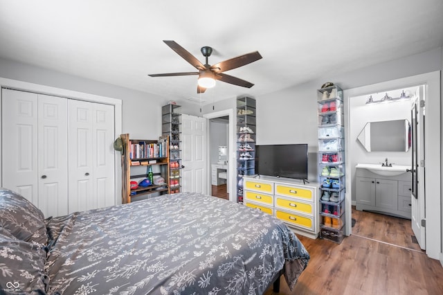 9267 N State Road 135, Morgantown, IN 46160 - bedroom with a closet, wood finished floors, ceiling fan, and ensuite bathroom