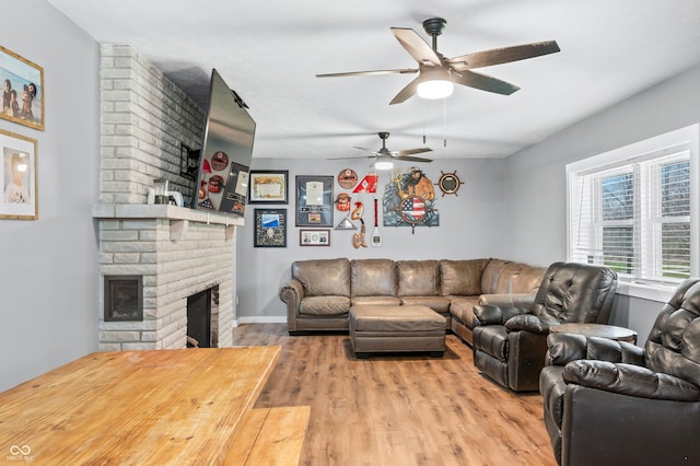 9267 N State Road 135, Morgantown, IN 46160 - living room featuring a ceiling fan, wood finished floors, and a fireplace