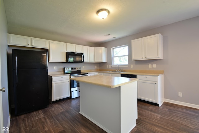 5262 Bogey Dr, Indianapolis, IN 46235 - kitchen featuring black appliances, dark wood finished floors, light countertops, and white cabinets