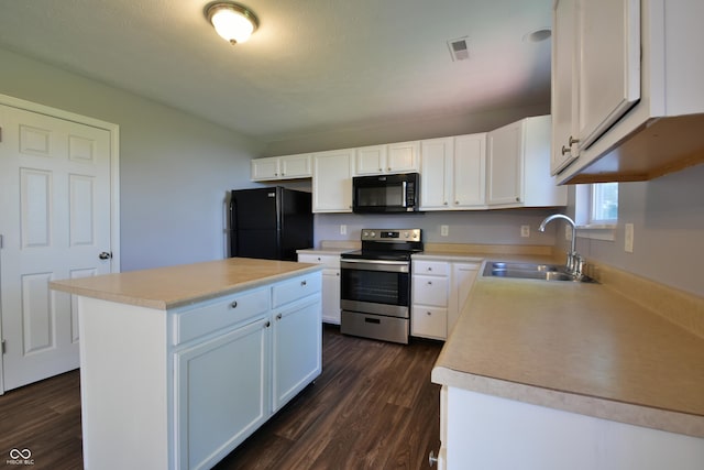5262 Bogey Dr, Indianapolis, IN 46235 - kitchen featuring black appliances, white cabinets, light countertops, dark wood-style flooring, and a kitchen island