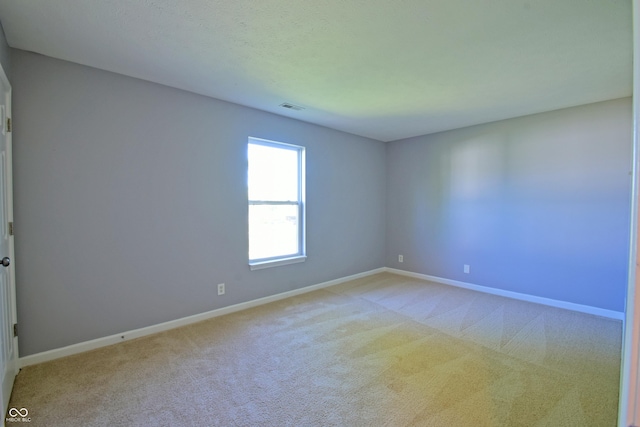 5262 Bogey Dr, Indianapolis, IN 46235 - carpeted spare room featuring baseboards