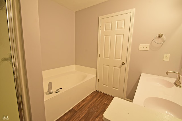 5262 Bogey Dr, Indianapolis, IN 46235 - full bathroom with wood finished floors, a bath, and double vanity