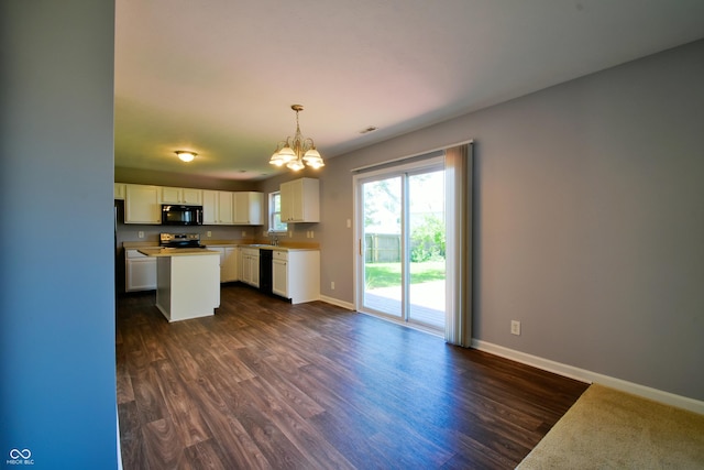 5262 Bogey Dr, Indianapolis, IN 46235 - kitchen with black appliances, a chandelier, dark wood-style floors, white cabinets, and light countertops