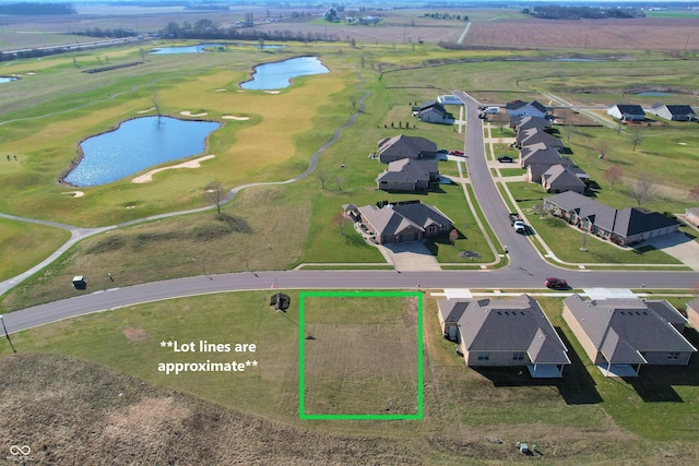 1130 Constitution Dr, Edinburgh, IN 46124 - aerial perspective of suburban area with a nearby body of water, property parcel outlined, and a golf club
