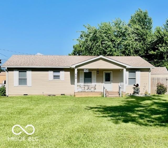 409 N Kyle St, Edinburgh, IN 46124 - view of front of home with crawl space, a porch, a front lawn, and roof with shingles