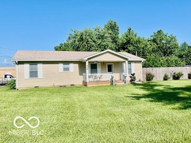 409 N Kyle St, Edinburgh, IN 46124 - view of front facade featuring crawl space and a porch