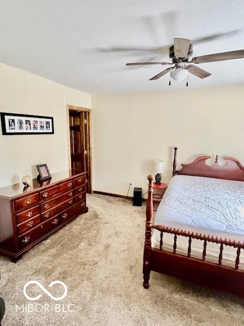 409 N Kyle St, Edinburgh, IN 46124 - bedroom featuring carpet flooring and a ceiling fan
