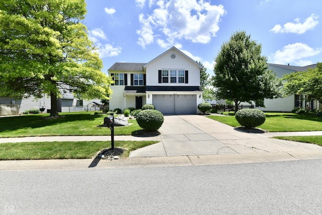 10539 Ross Xing, Fishers, IN 46038 - traditional-style home with driveway, a garage, and a front lawn