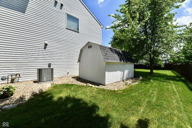 10539 Ross Xing, Fishers, IN 46038 - view of side of home featuring a shed and a lawn