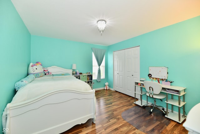 10539 Ross Xing, Fishers, IN 46038 - bedroom featuring wood finished floors, a closet, and an office area