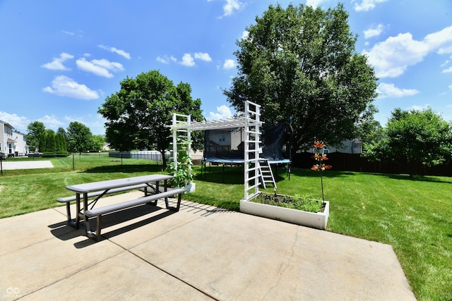 10539 Ross Xing, Fishers, IN 46038 - view of community featuring a trampoline and a patio area