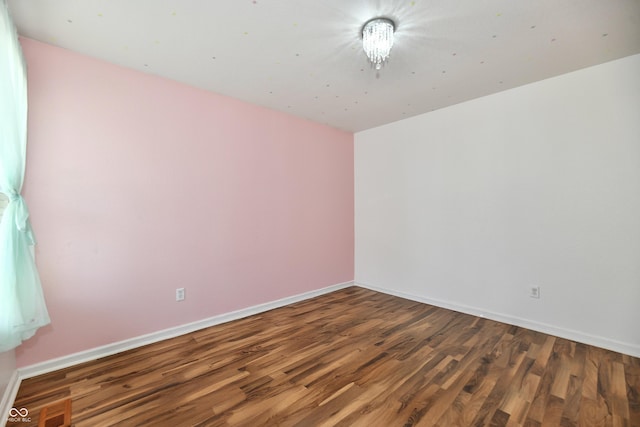 10539 Ross Xing, Fishers, IN 46038 - spare room with wood finished floors and baseboards