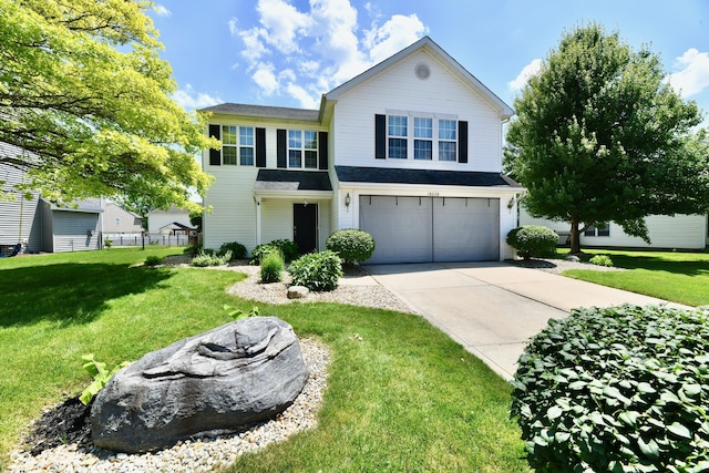 10539 Ross Xing, Fishers, IN 46038 - traditional home with driveway, a garage, and a front yard
