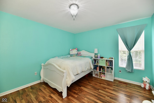 10539 Ross Xing, Fishers, IN 46038 - bedroom featuring wood finished floors and baseboards