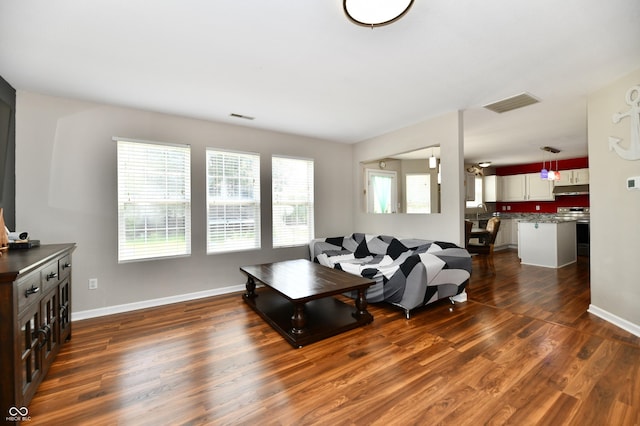 10539 Ross Xing, Fishers, IN 46038 - living area with dark wood finished floors and baseboards