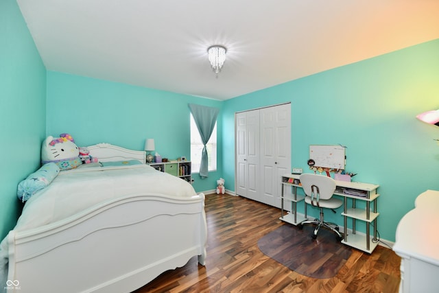 10539 Ross Xing, Fishers, IN 46038 - bedroom featuring wood finished floors, a closet, and a desk