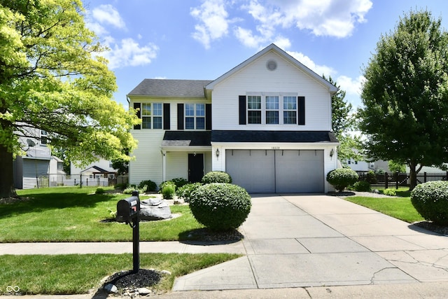 10539 Ross Xing, Fishers, IN 46038 - traditional home with an attached garage, driveway, and roof with shingles