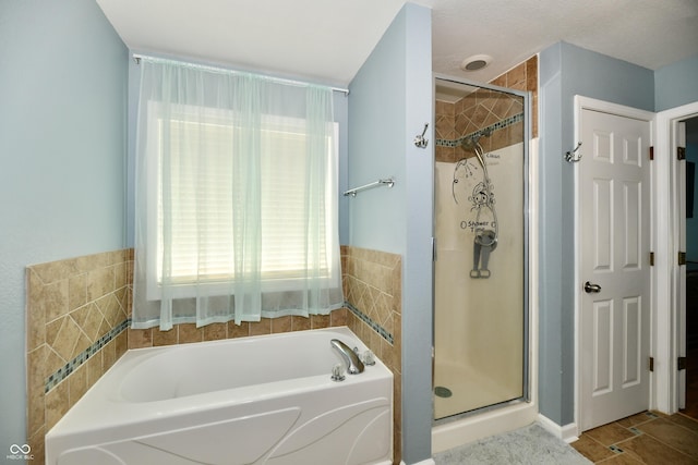 10539 Ross Xing, Fishers, IN 46038 - bathroom featuring a stall shower and a bath