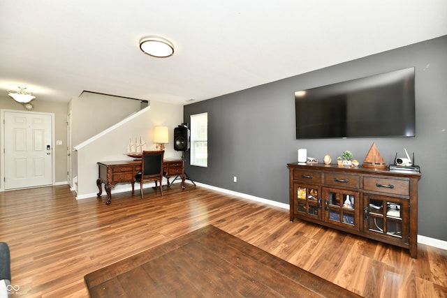 10539 Ross Xing, Fishers, IN 46038 - living area featuring wood finished floors and baseboards